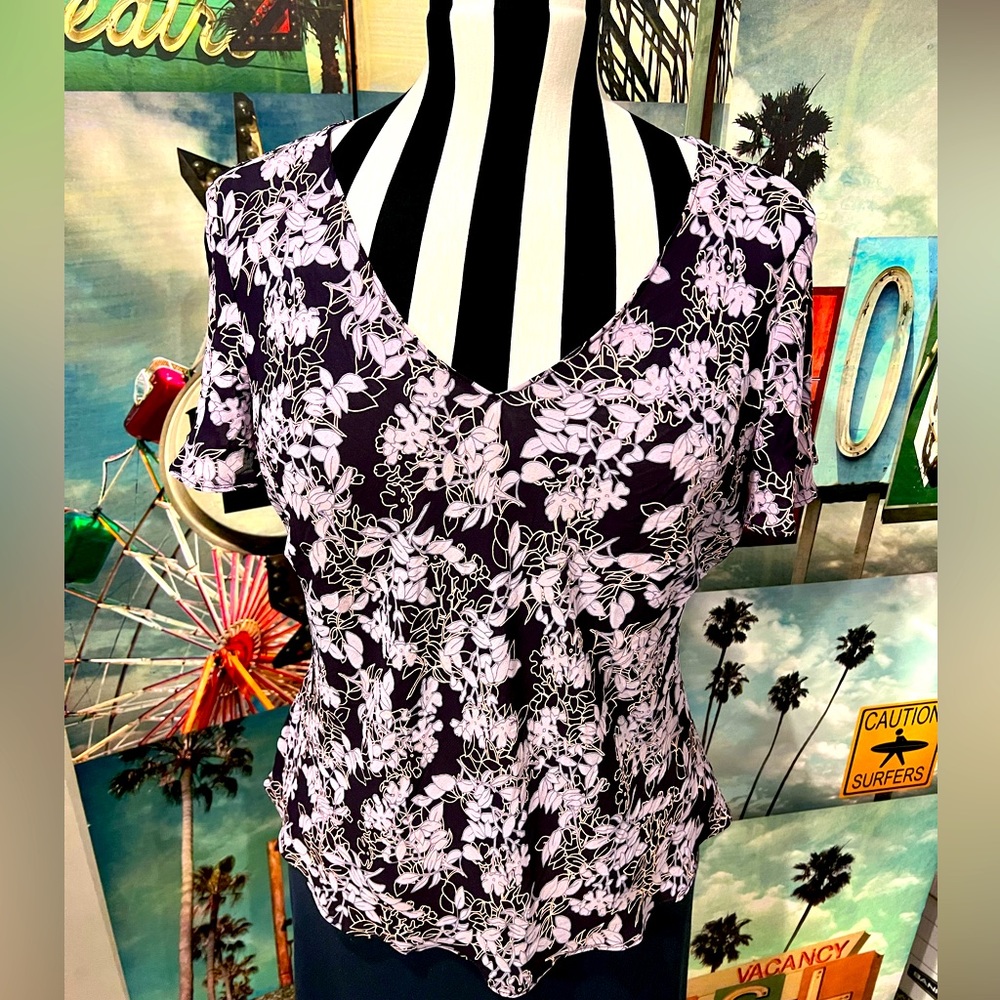 Flutter sleeve V-neck floral top from England